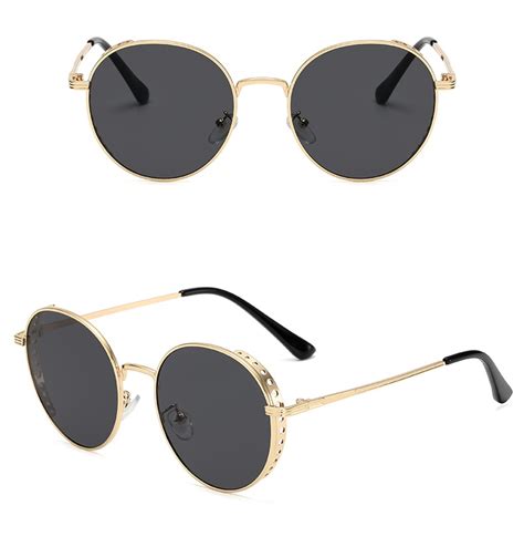 black round sunglasses with gold frame